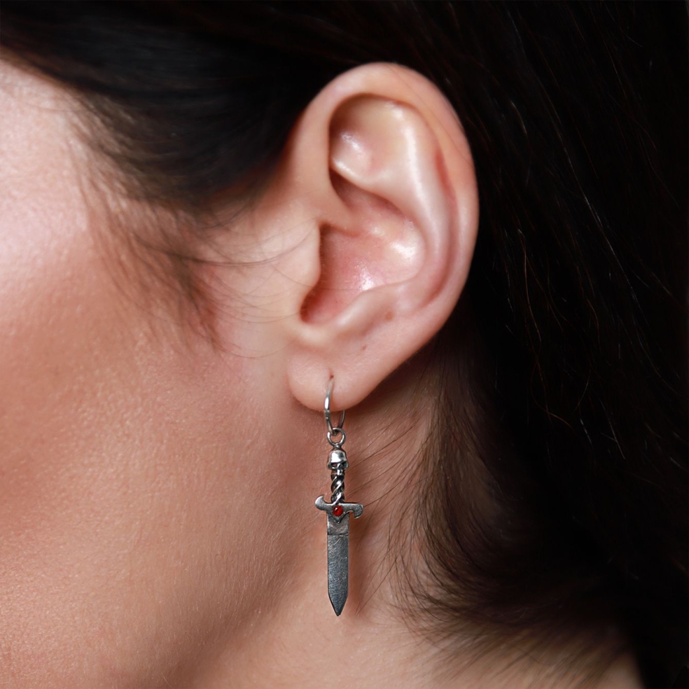 Sterling silver skull & dagger earrings with red garnet stone.