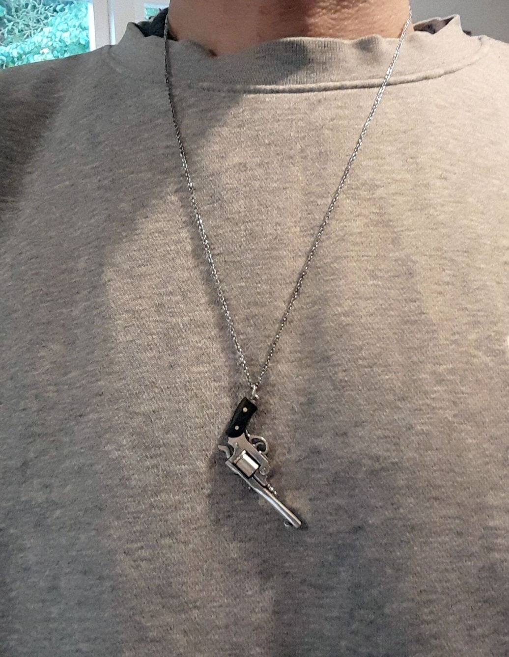 Revolver necklace worn