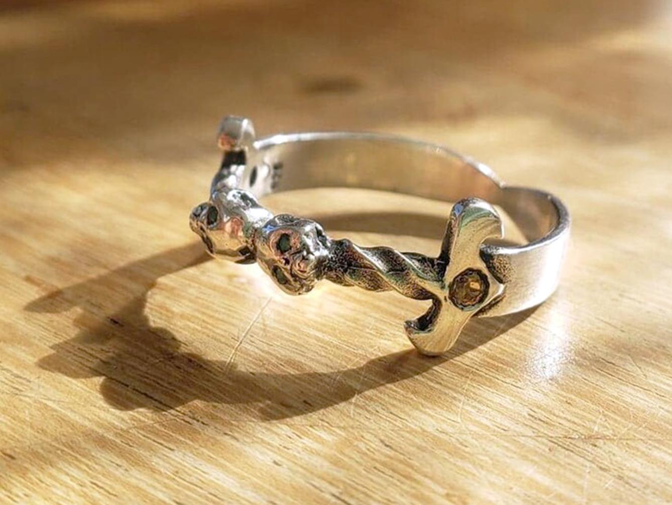 Sterling silver dagger ring with citrine stones and emerald eyes