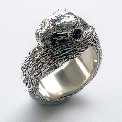 Sterling silver otter ring.