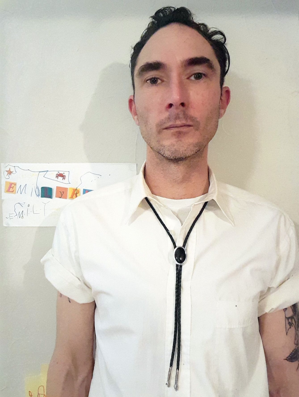Snake bolo tie being worn