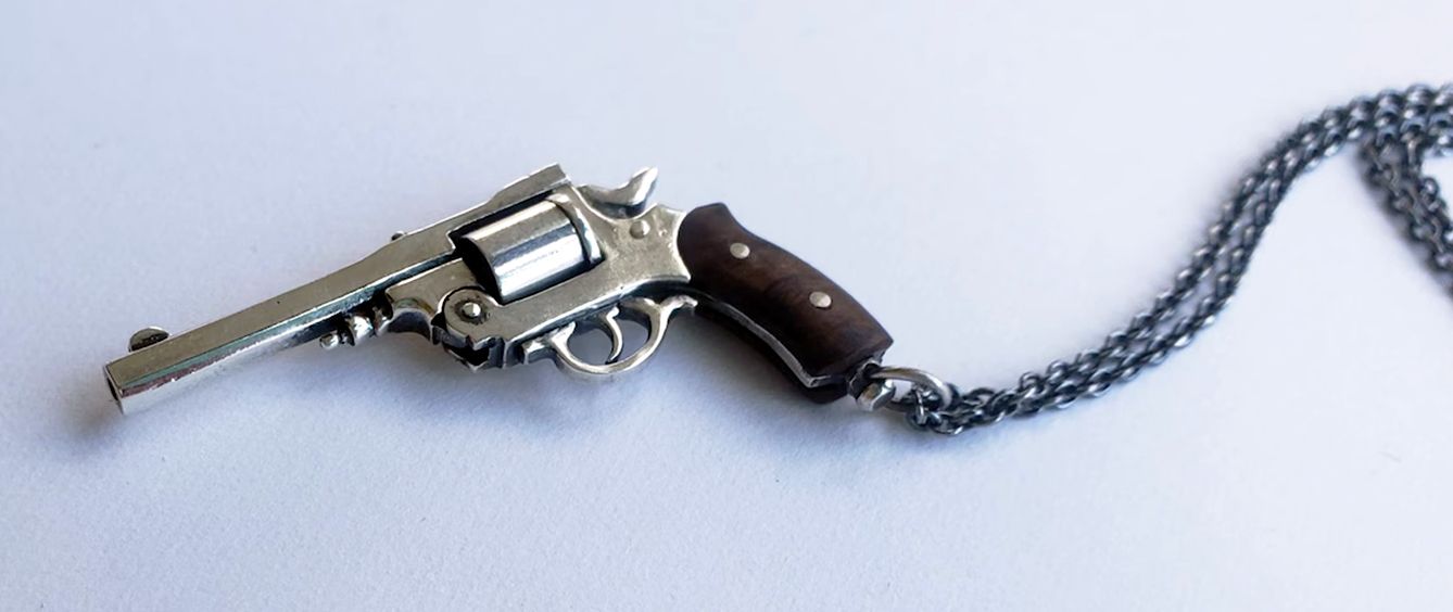 Western revolver necklace