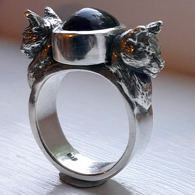 Handmade one-off sterling silver cat ring with cat’s eye stone setting