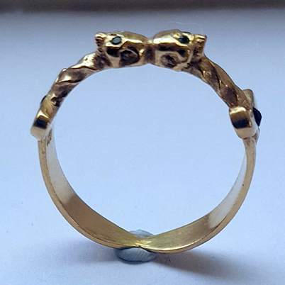 Sterling silver 14k gold-plated Double Dagger ring with emerald eyes and garnet stone setting. size q